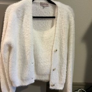 Matching fuzzy white tank and sweater. Never worn. Size small.